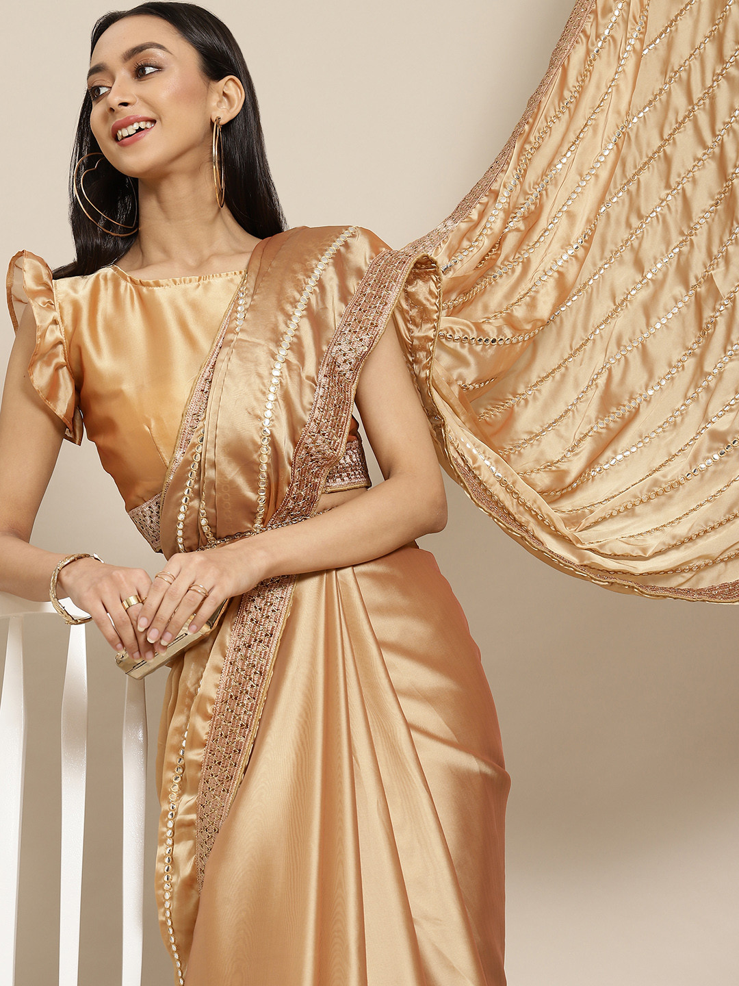 

Mitera Gold-Toned Embellished Mirror Work Heavy Work Saree