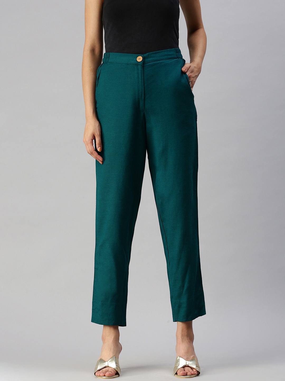 

Global Desi Women Teal Blue Solid Straight Fit Trousers