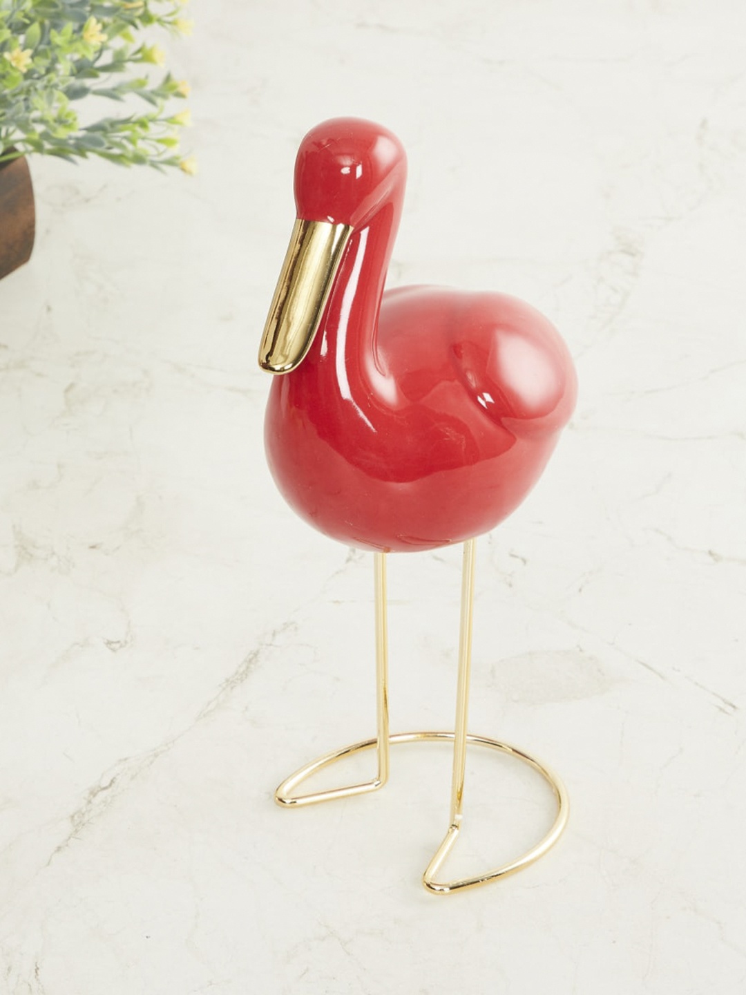 

Home Centre Assorted Asgard Red Solid Ceramic Big Duck Figurine