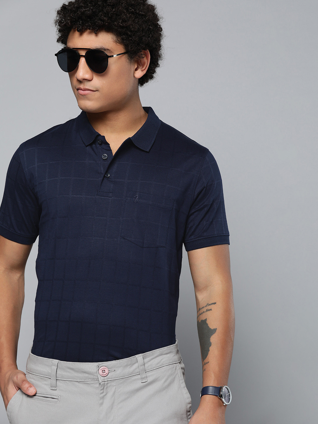 

Indian Terrain Men Navy Blue Self-Checked Polo Collar Pure Cotton T-shirt