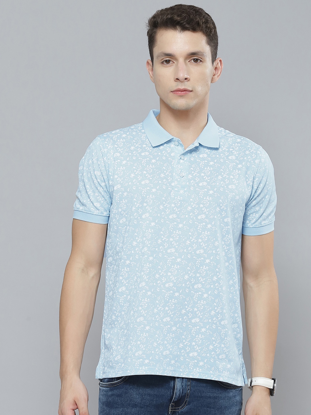 

Indian Terrain Men Blue & White Floral Printed Polo Collar Pure Cotton T-shirt