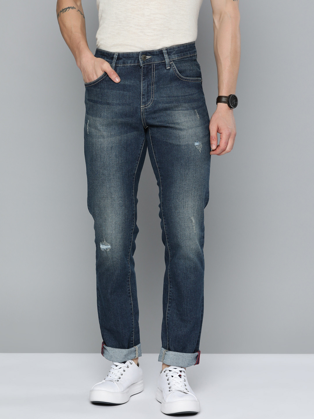 

Indian Terrain Men Brooklyn Slim Fit Low Distress Light Fade Stretchable Jeans, Navy blue