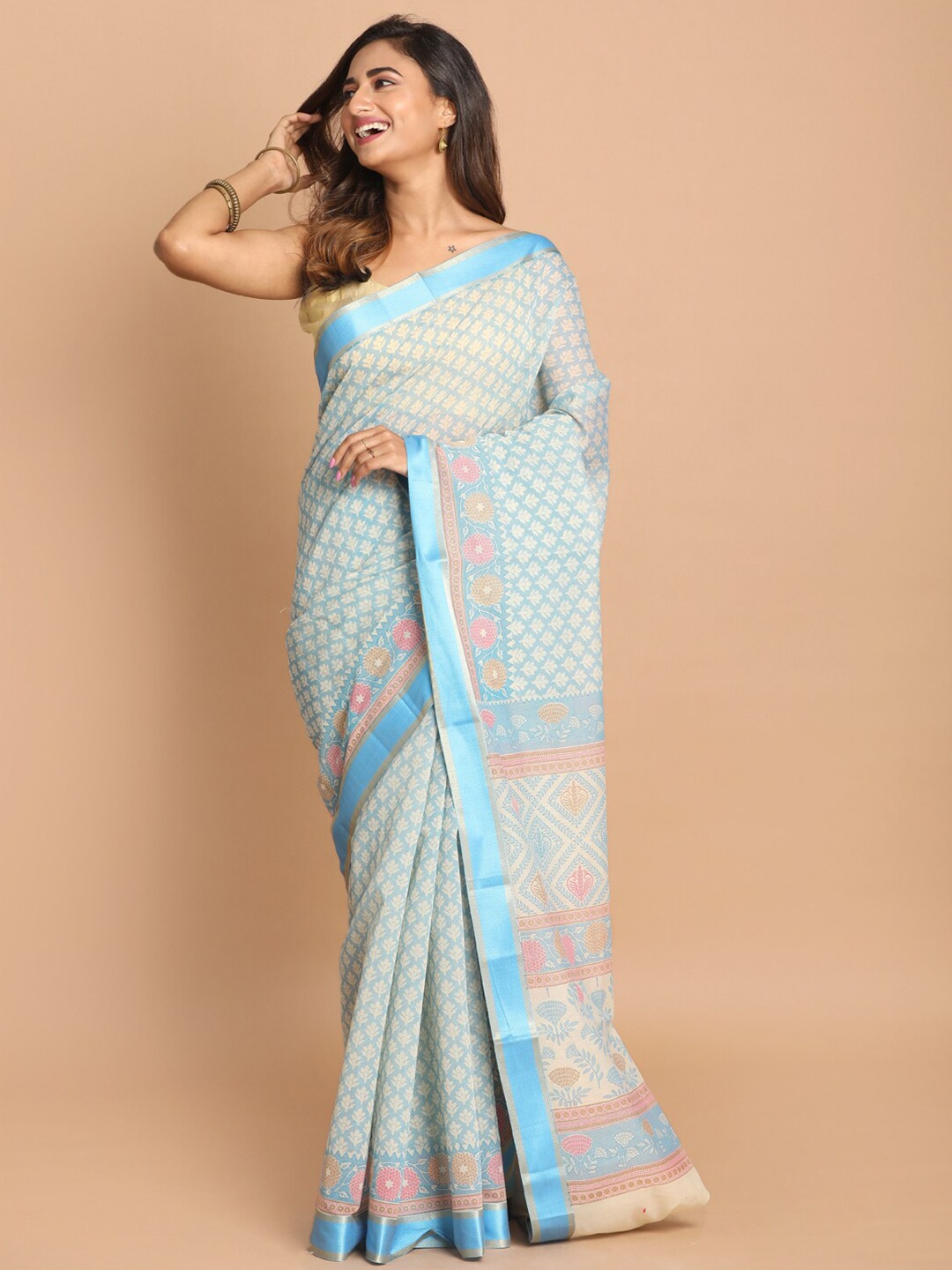 

Saranee Blue & Pink Ethnic Motifs Saree