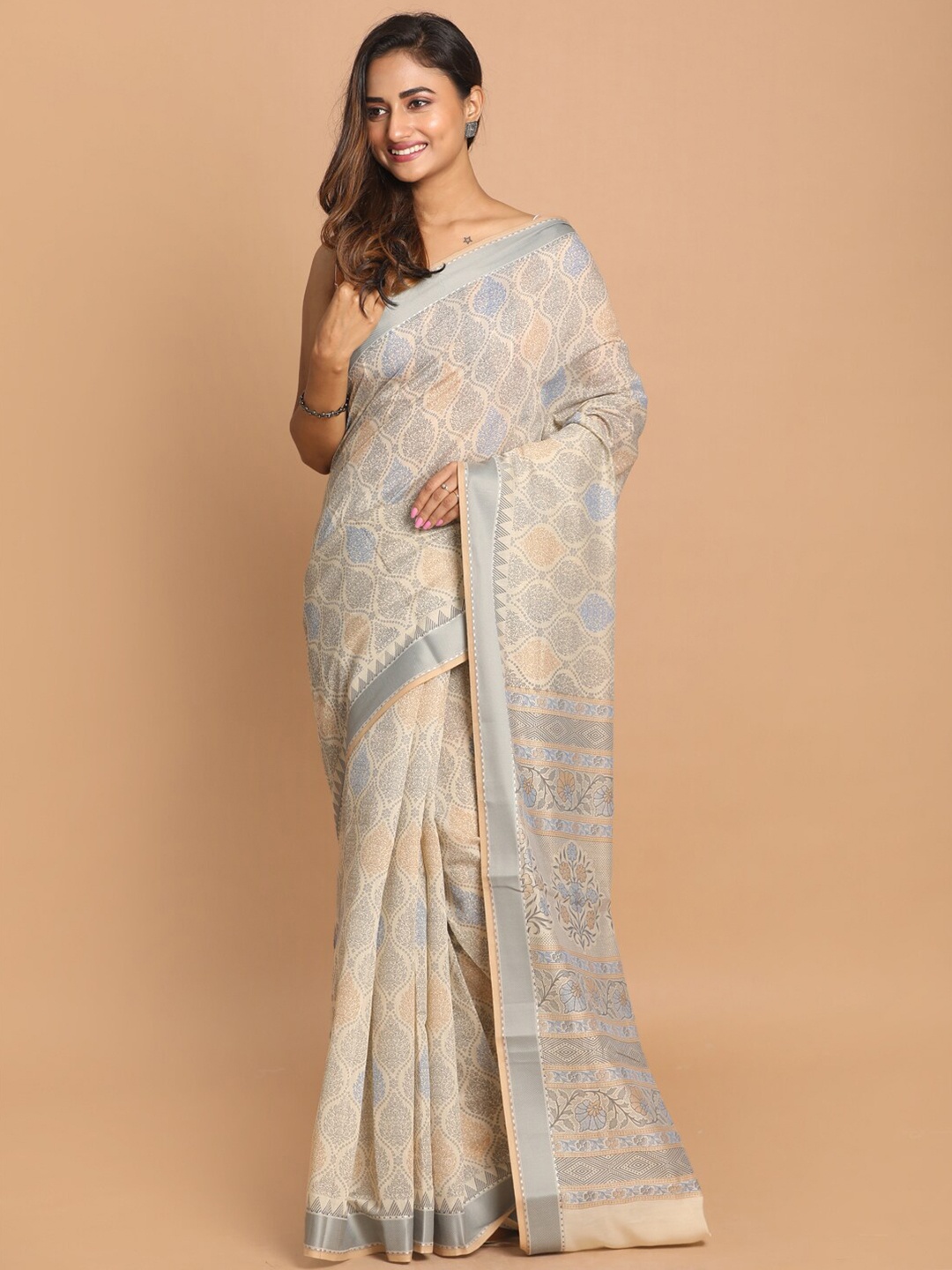 

Saranee Grey & Silver Ethnic Motifs Saree