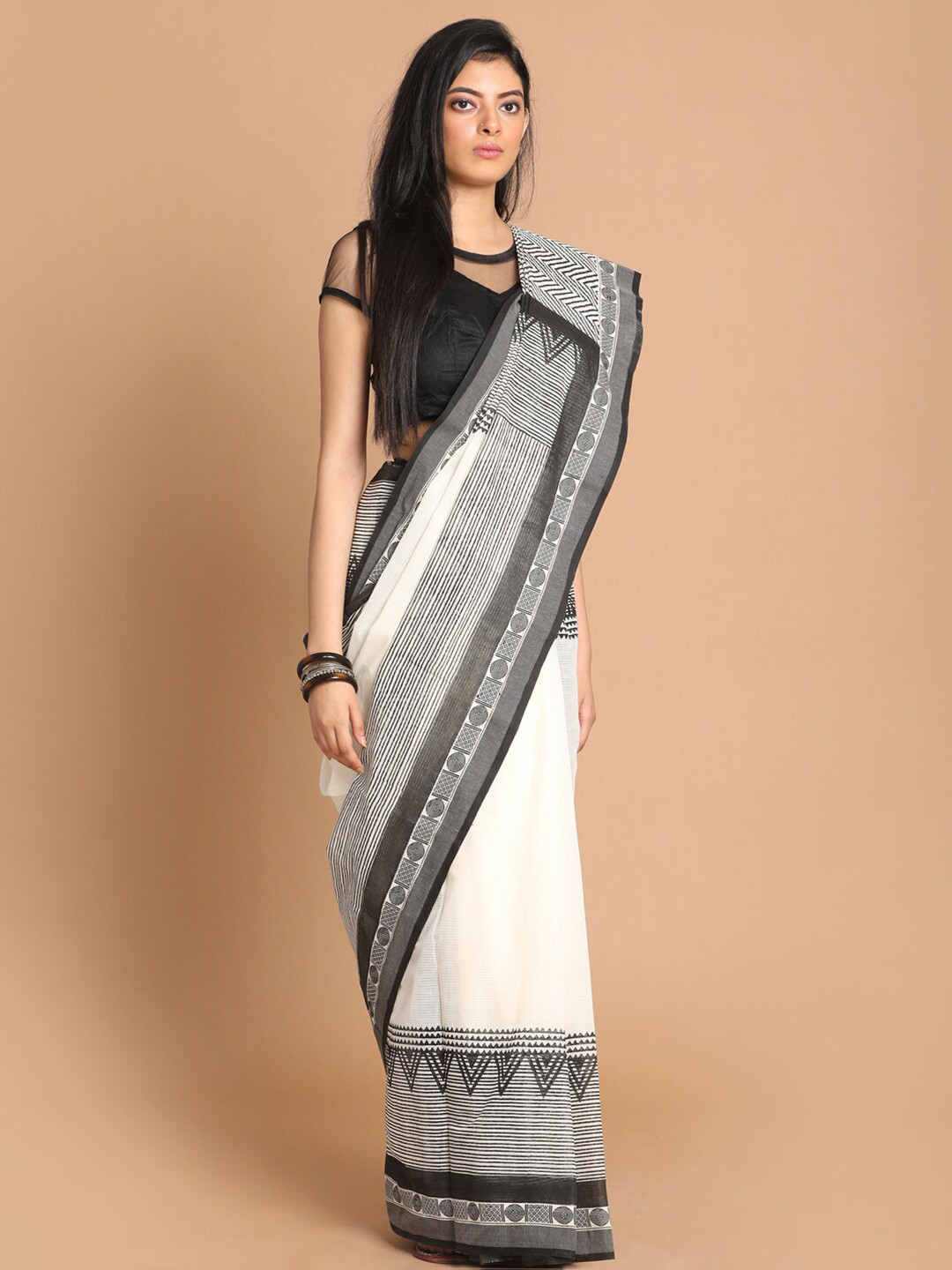 

Indethnic Black & White Pure Cotton Saree