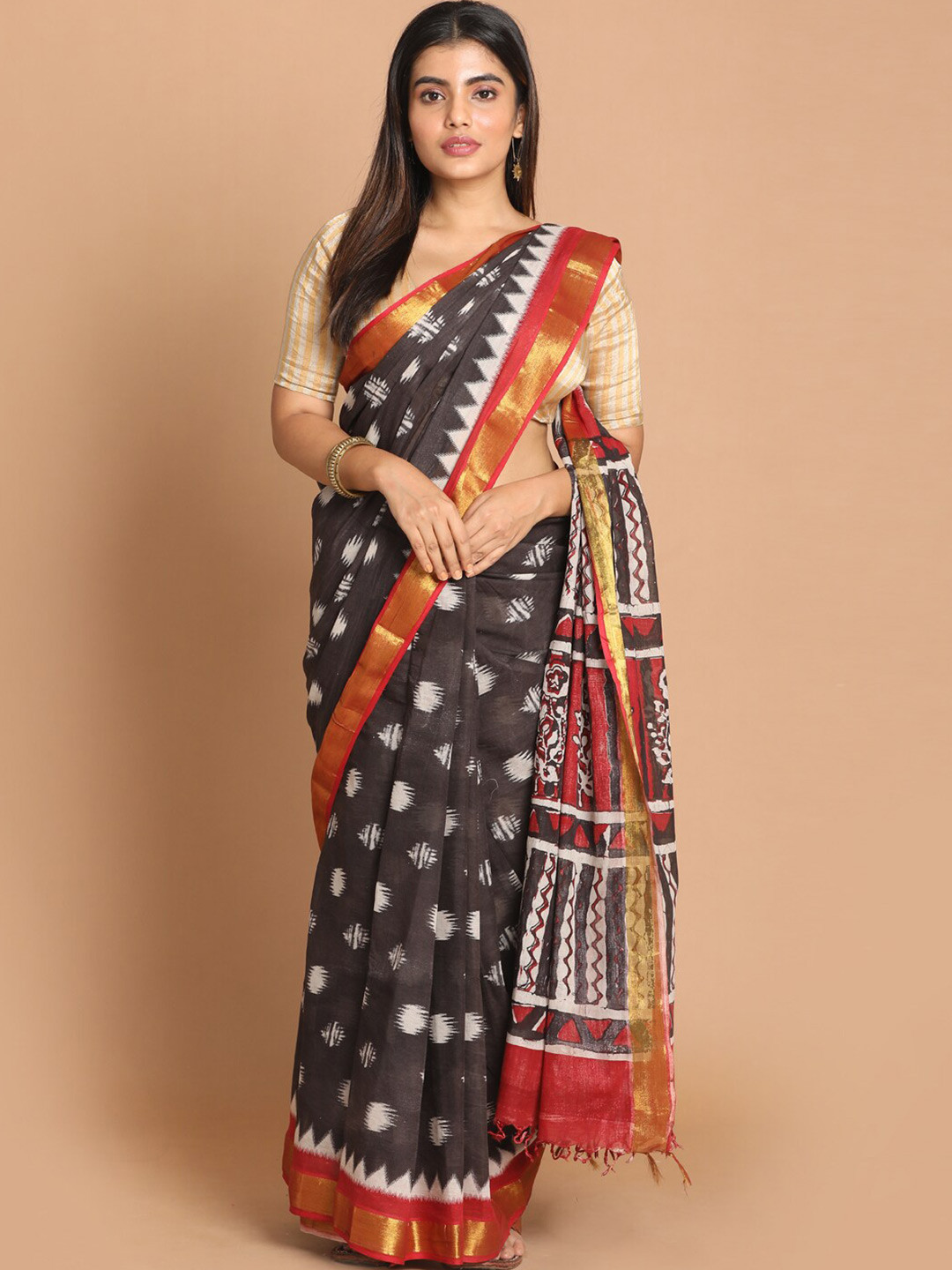 

Saranee Black & White Ethnic Motifs Zari Pure Cotton Saree
