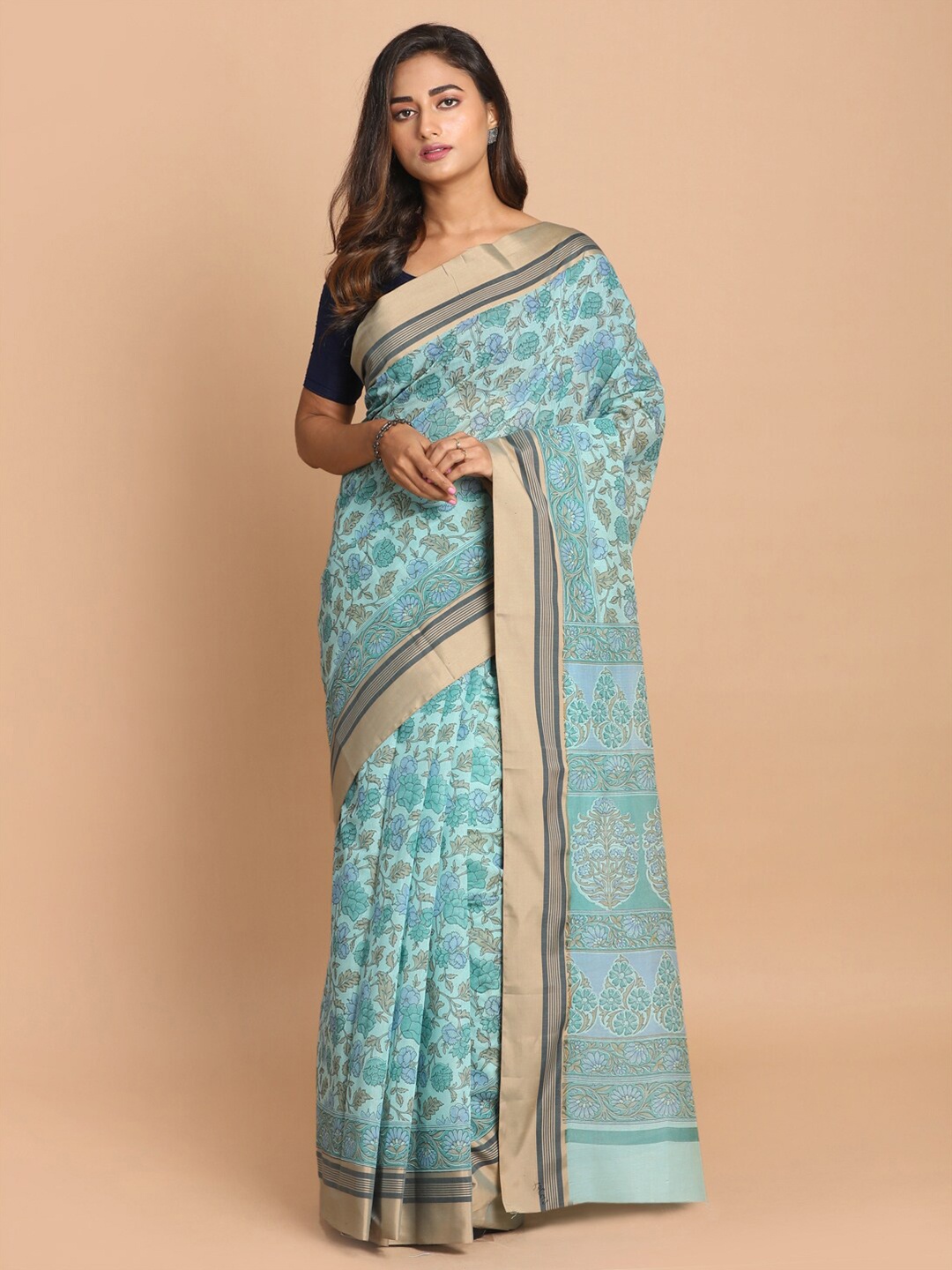 

Saranee Blue & Gold-Toned Floral Zari Saree