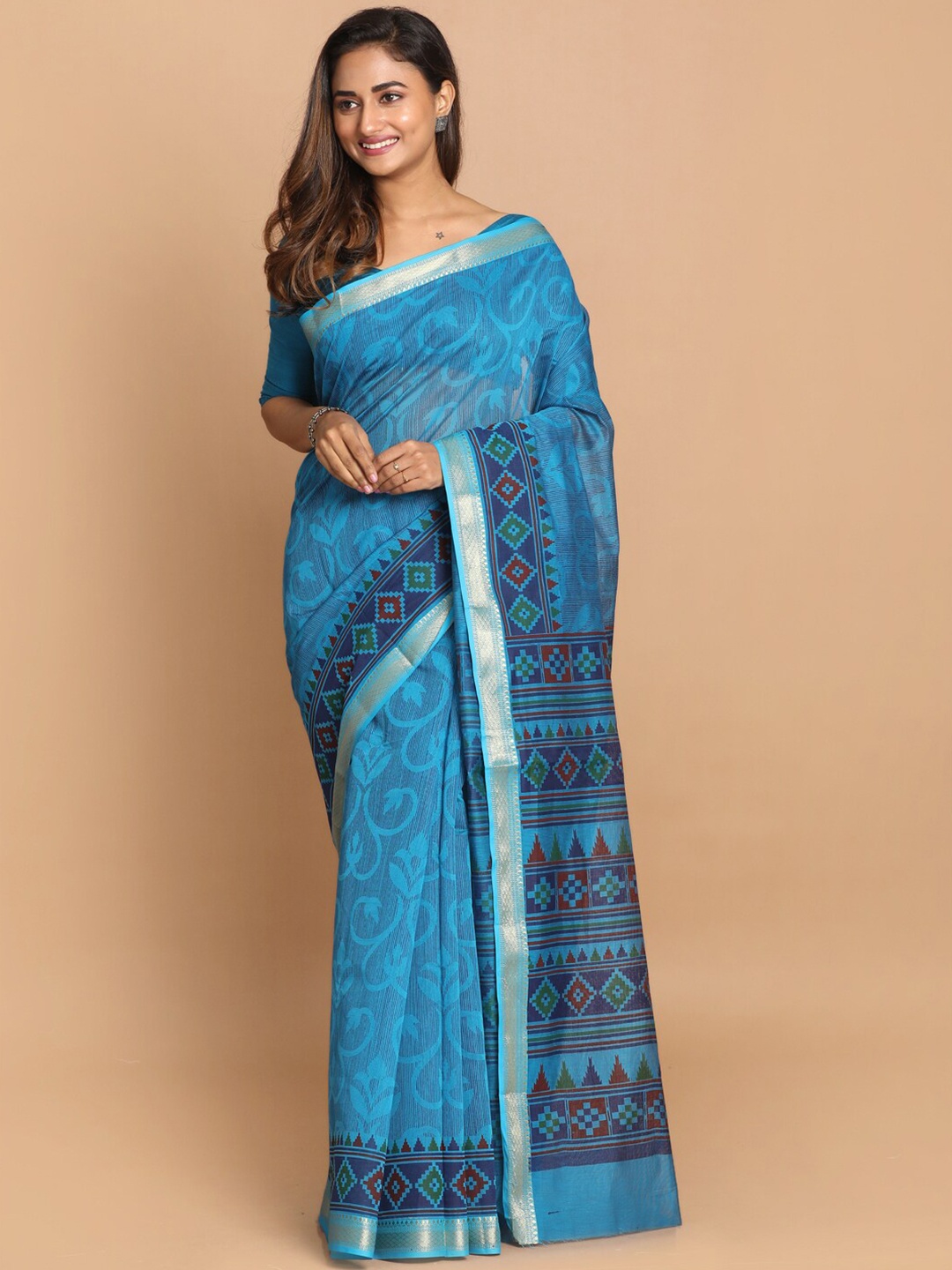 

Saranee Blue & Red Ethnic Motifs Zari Saree