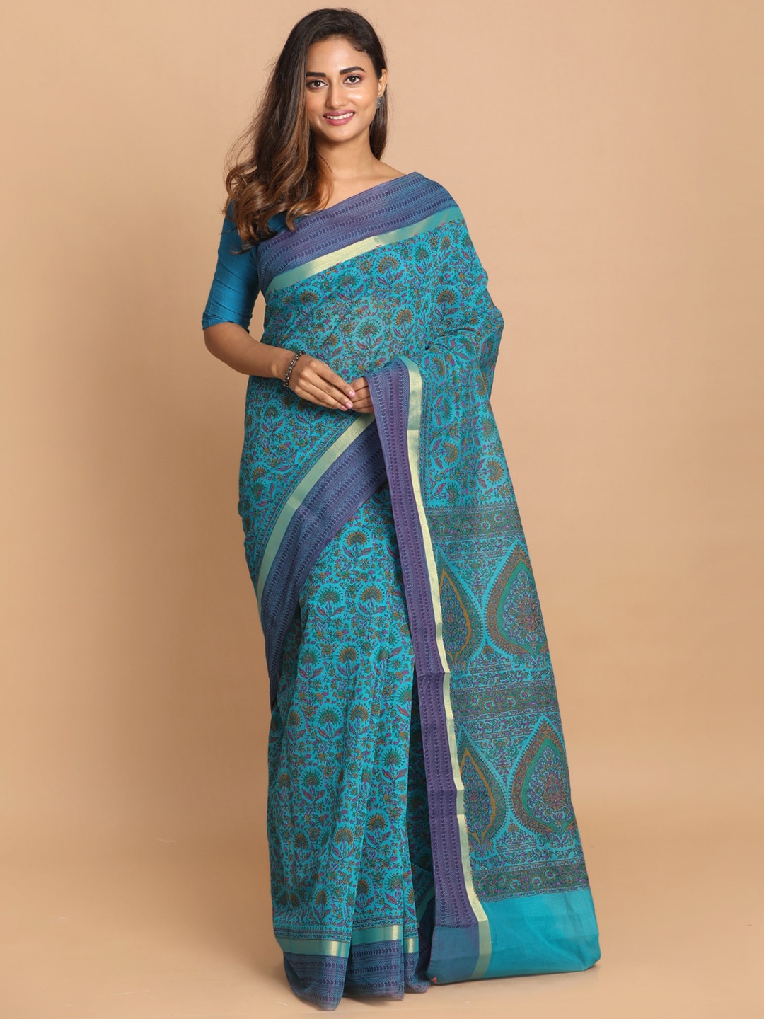 

Saranee Turquoise Blue & Mustard Ethnic Motifs Saree