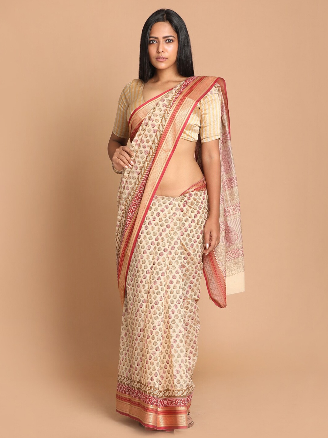 

Saranee Cream-Coloured & Maroon Ethnic Motifs Zari Saree