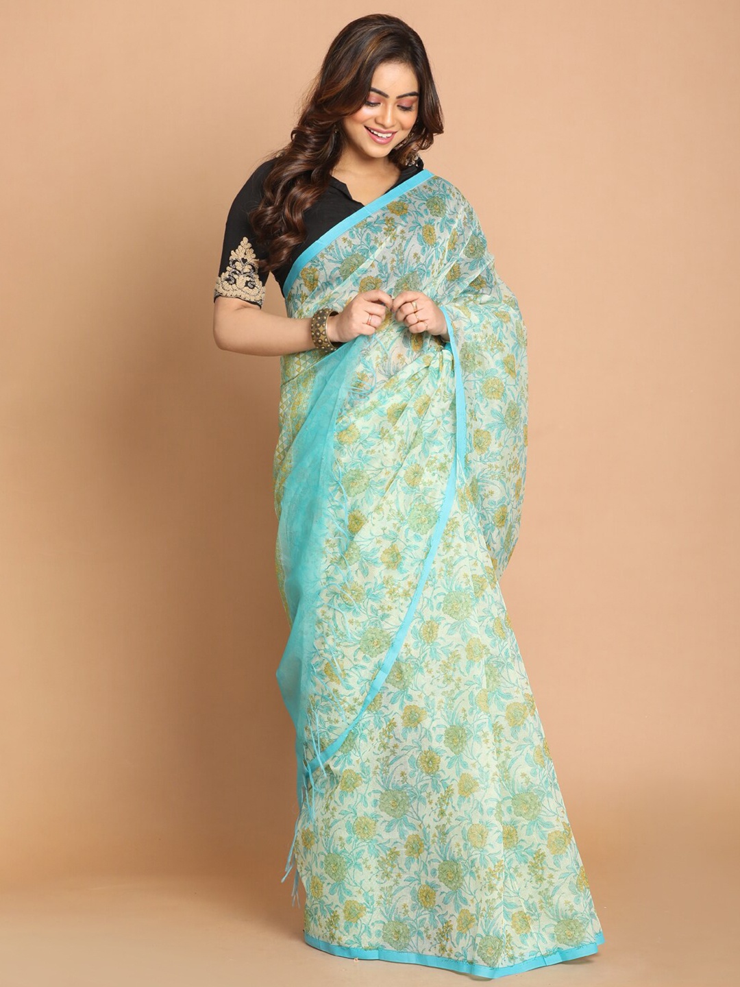 

Indethnic Blue & Green Floral Printed Supernet Saree