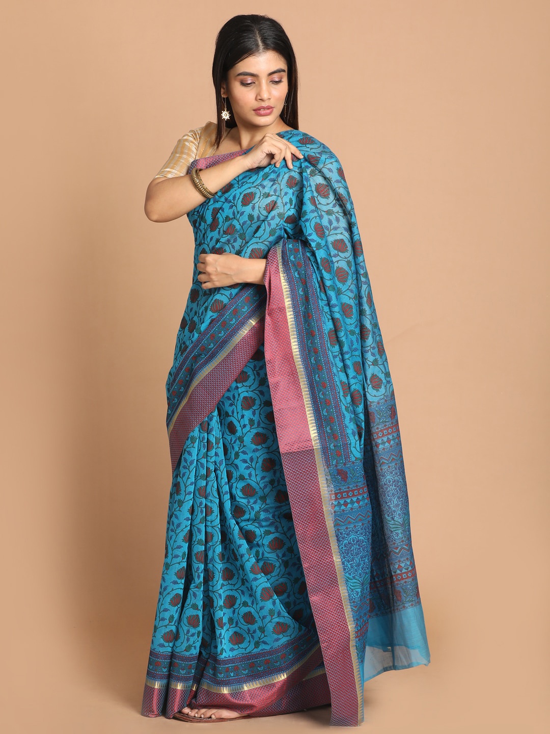 

Saranee Blue & Maroon Floral Zari Saree