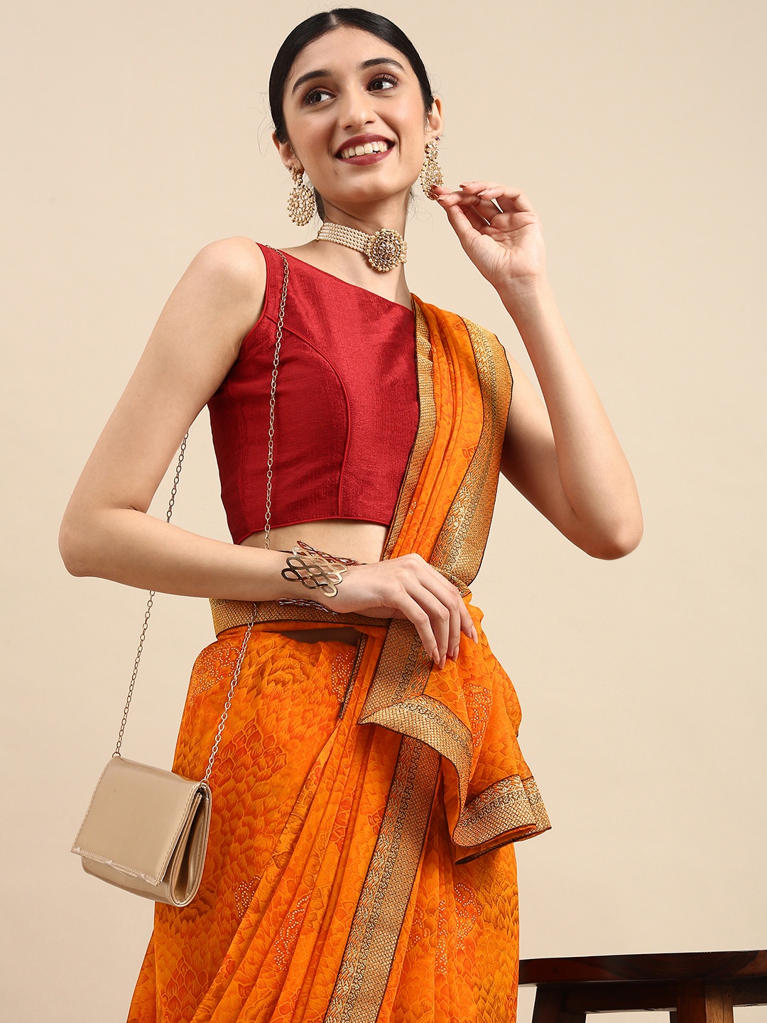 

Anouk Orange Ethnic Motifs Pure Georgette Bhagalpuri Saree