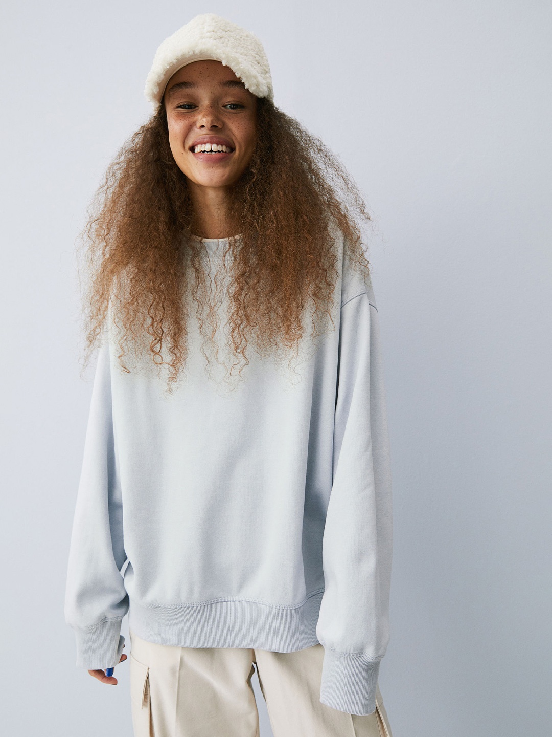 

H&M Women Blue Solid Sweatshirt
