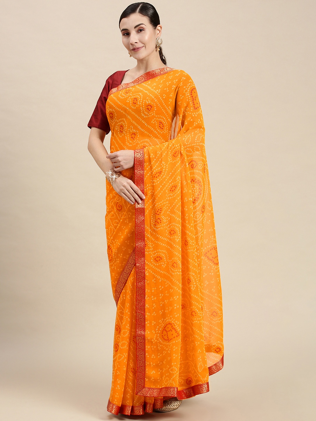 

Mitera Orange & Yellow Pure Georgette Bandhani Saree