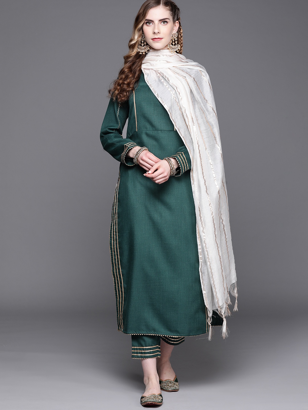 

Inddus Women Green Regular Kurta with Palazzos & With Dupatta