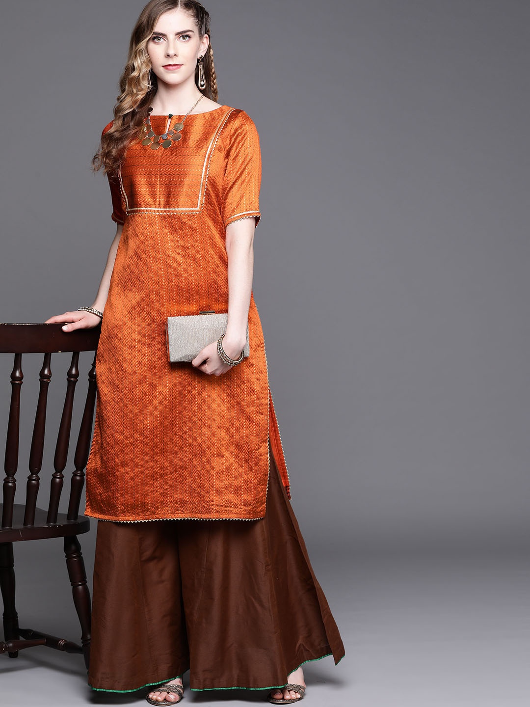 

Inddus Women Orange Yoke Design Keyhole Neck Thread Work Brocade Kurta