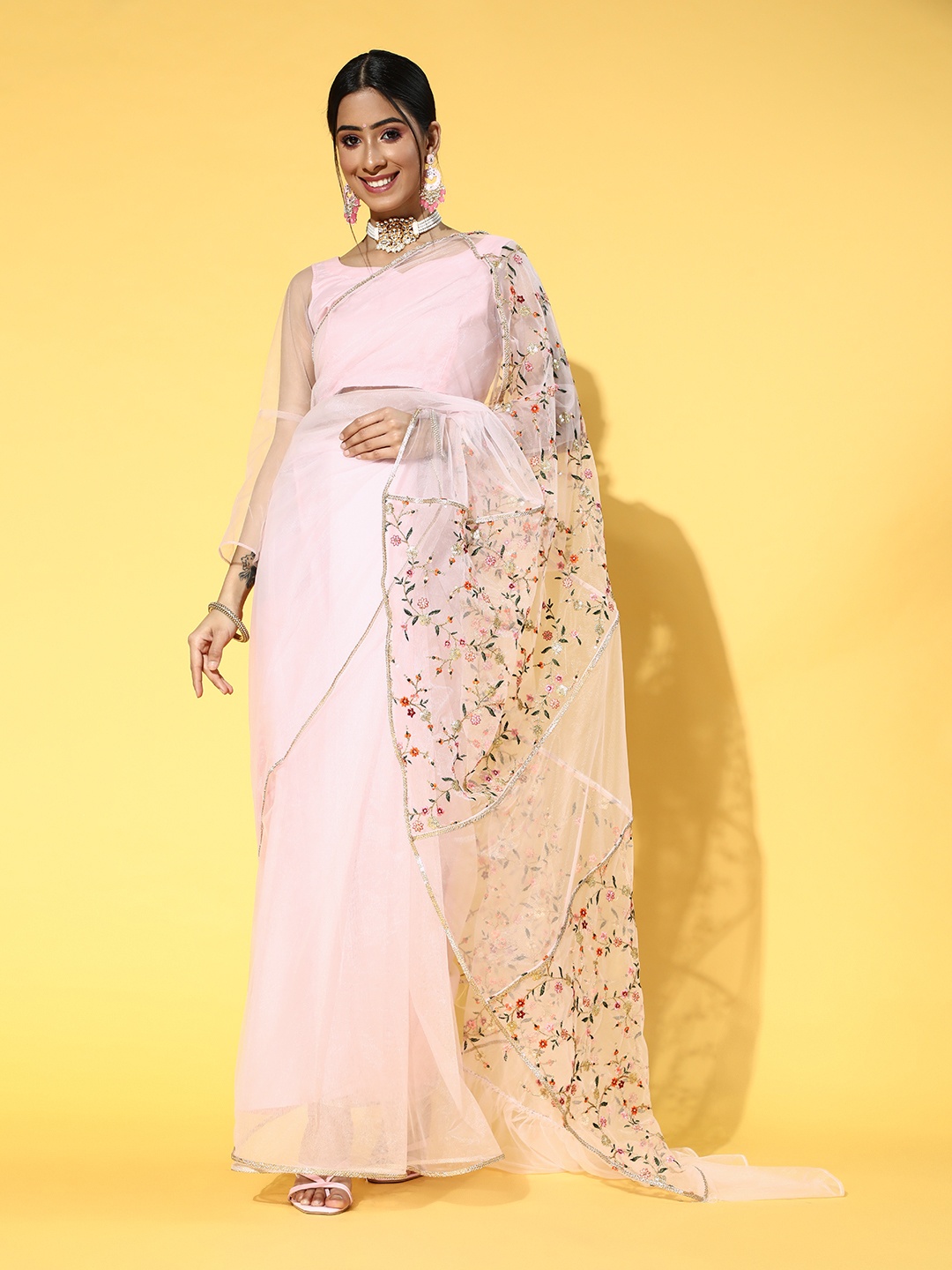 

Inddus Women Pink Net Saree with Embroidered Detail