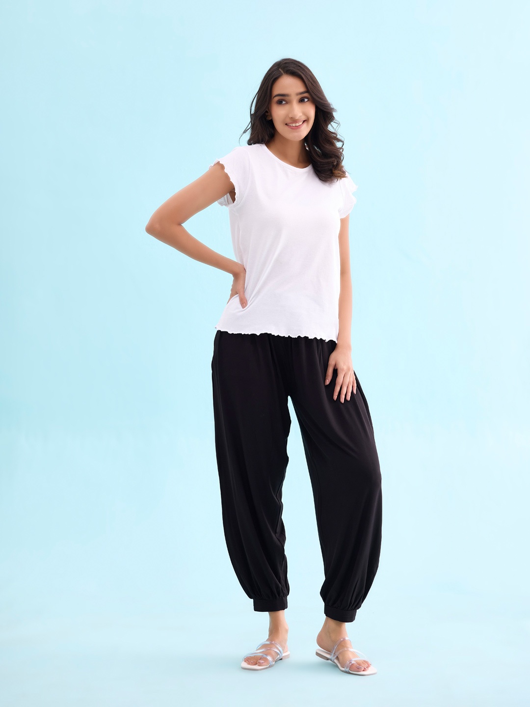 

Go Colors Women Black Solid Loose Fit Harem Pants