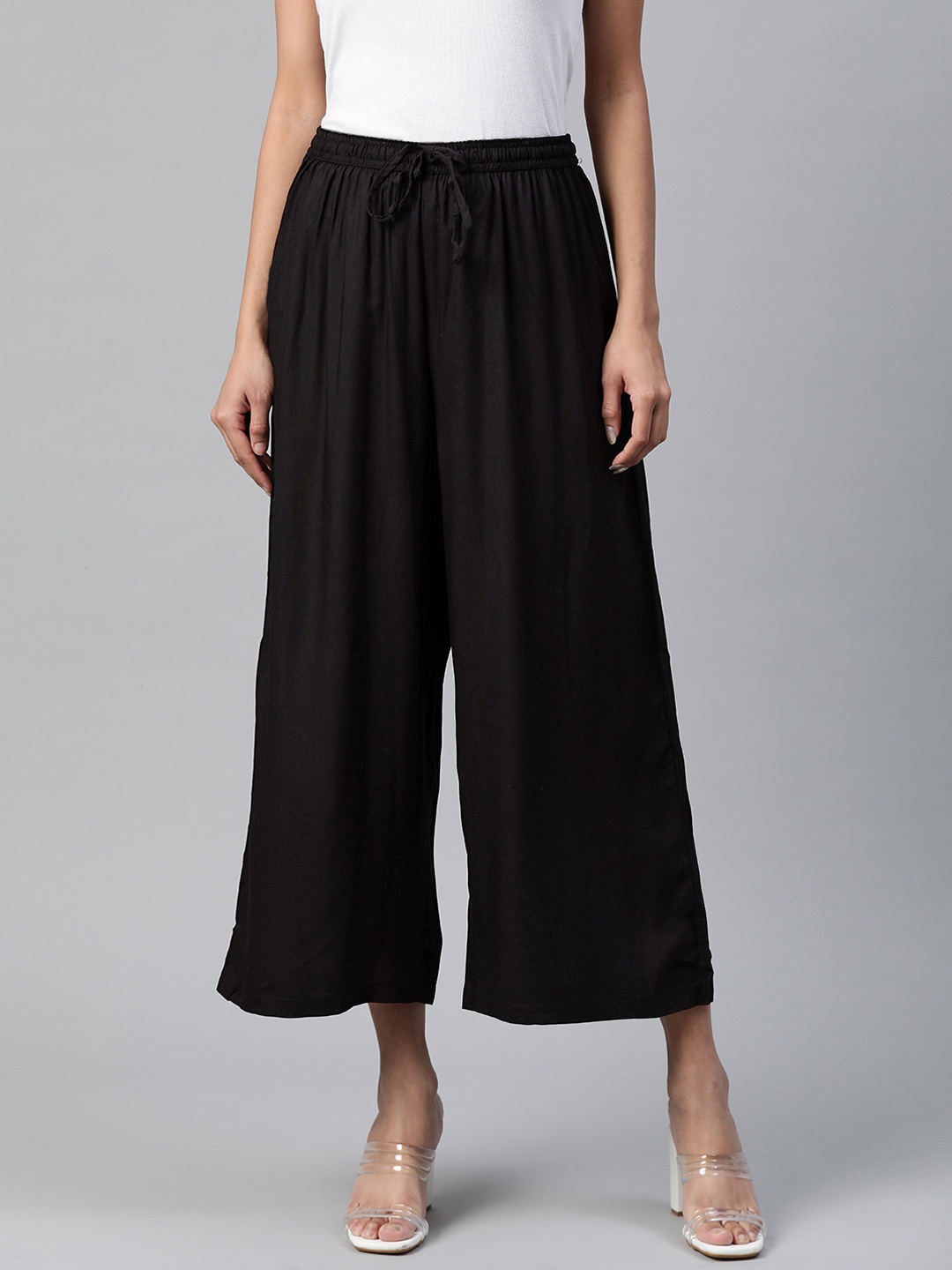 

Rangriti Women Black Solid Flared Woven Palazzos