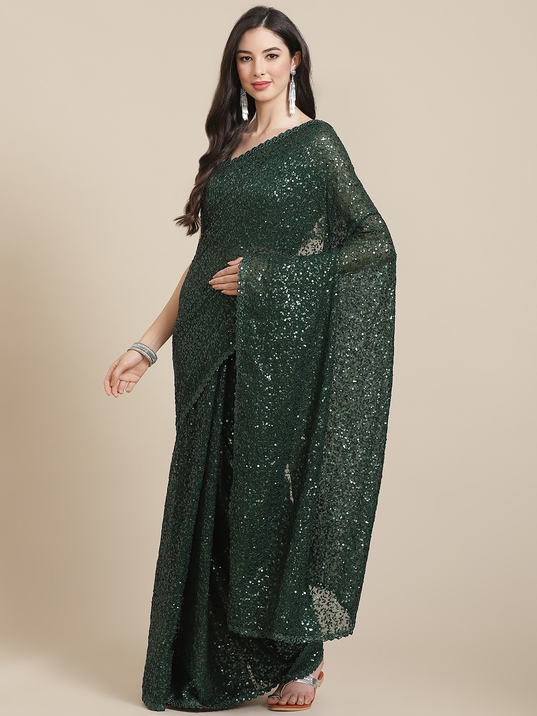 

Readiprint Fashions Green Sequinned Pure Georgette Heavy Work Saree
