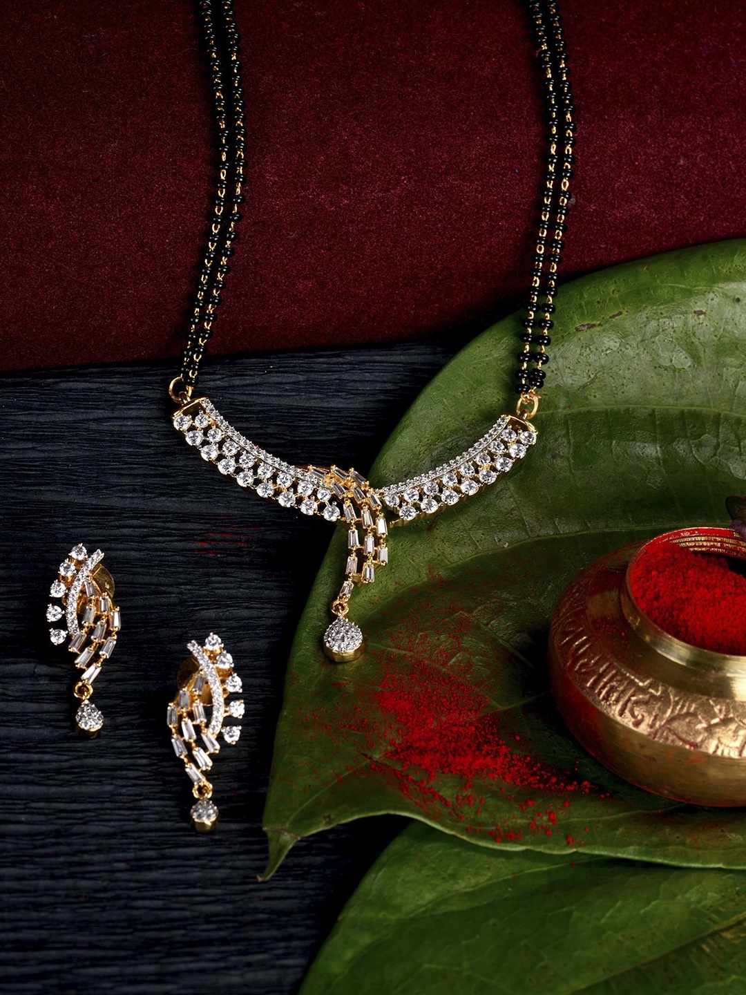 

Saraf RS Jewellery Gold-Plated & White CZ-Studded & Beaded Mangalsutra With Earrings