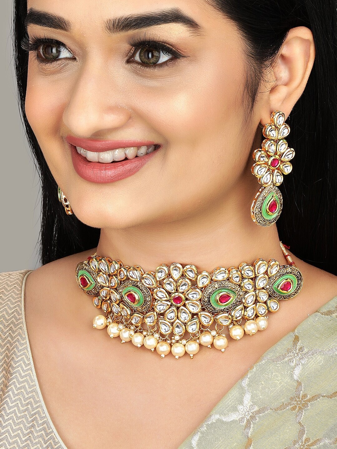 

Anouk Gold-Plated Kundan & Ruby Studded Enameled Choker Jewellery Set