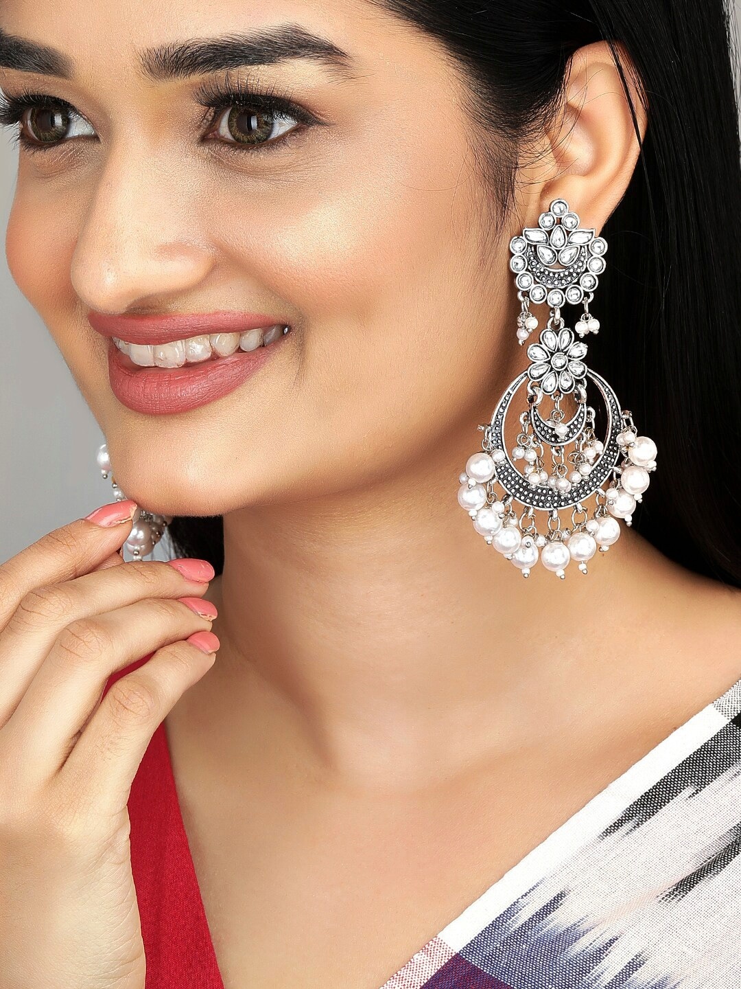 

Anouk Silver-Toned Pearls Studded Oxidised Crescent Shaped Chandbalis