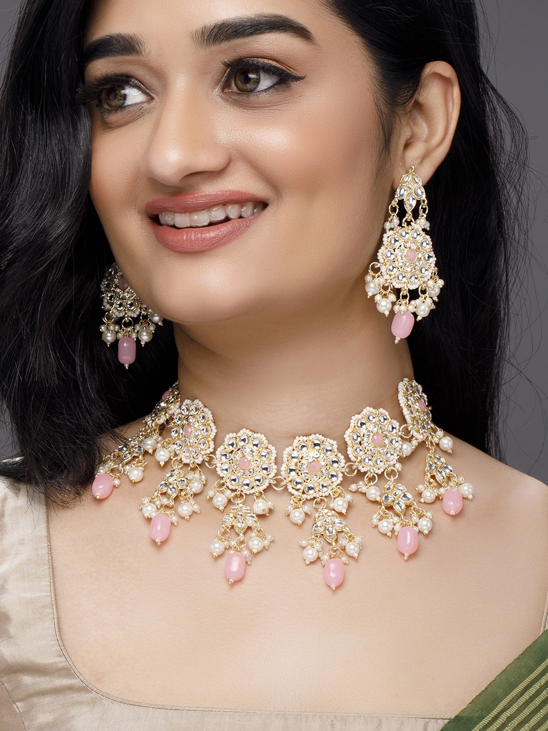 

Anouk Gold-Plated White & Pink Kundan Studded & Beaded Jewellery Set