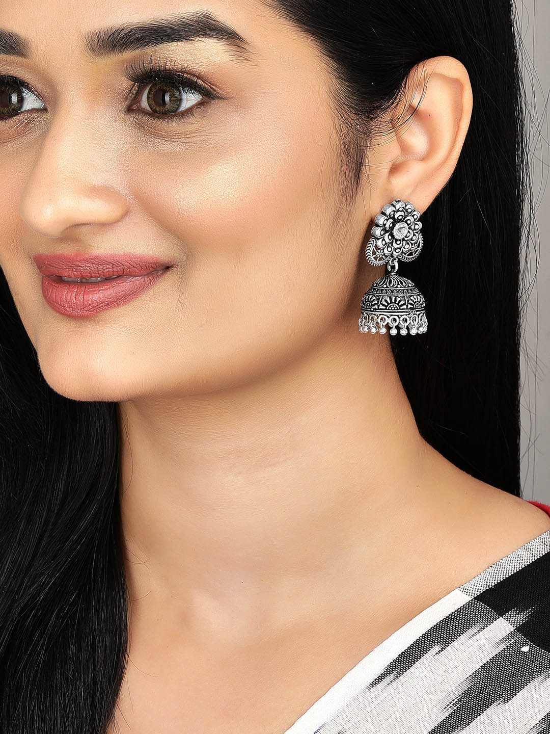 

Anouk Silver-Toned Dome Shaped Jhumkas Earrings