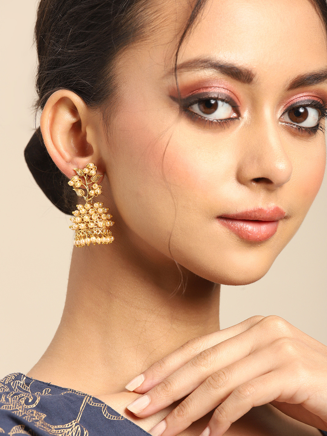

Anouk Gold-Toned & Cream-Coloured Beaded Dome Shaped Jhumkas Earrings