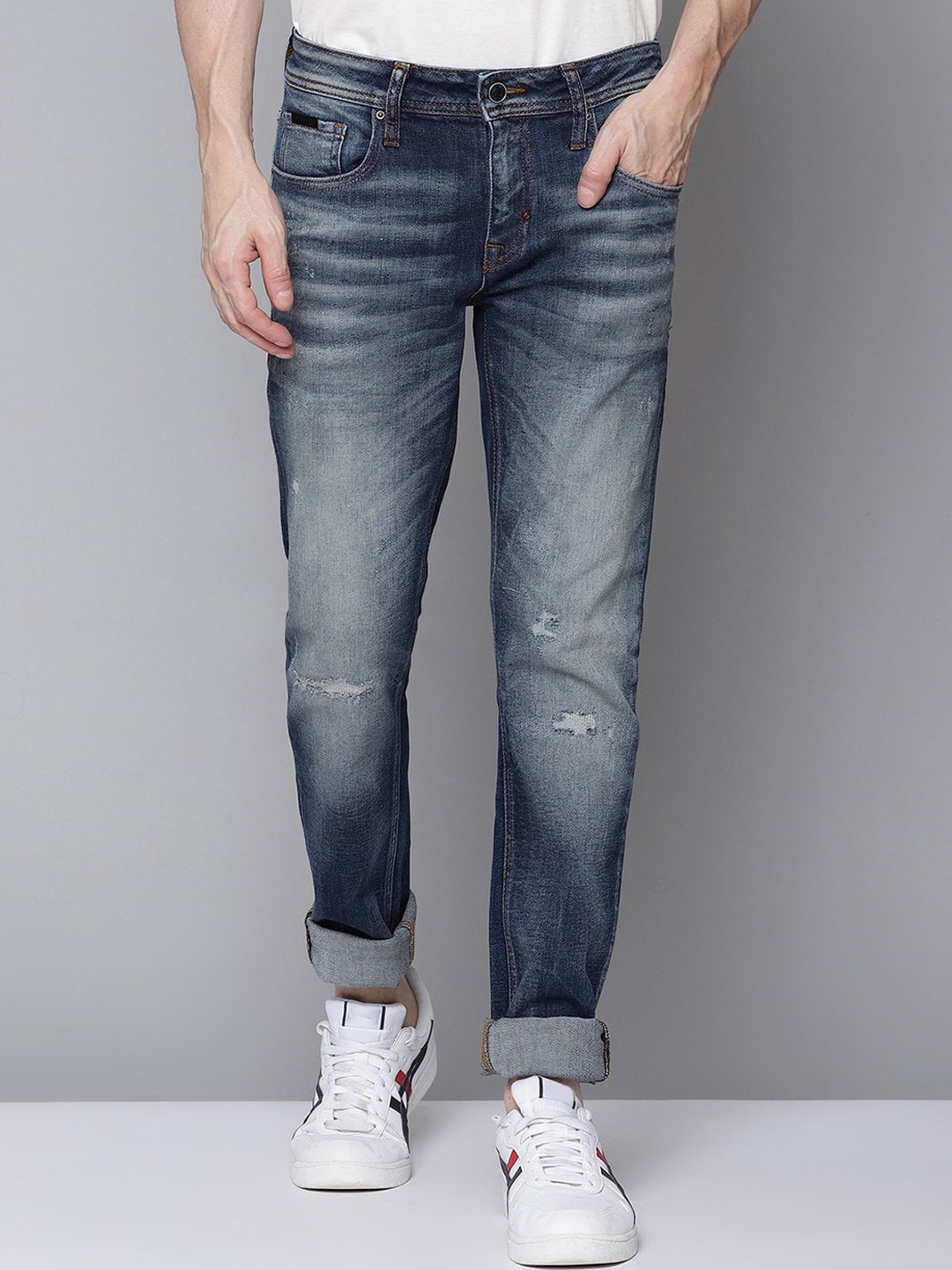 

Antony Morato Men Blue Tapered Fit Mildly Distressed Heavy Fade Stretchable Jeans