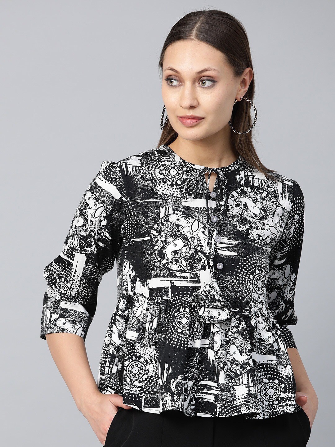 

Cottinfab Black & White Ethnic Printed Tie-Up Neck Regular Top