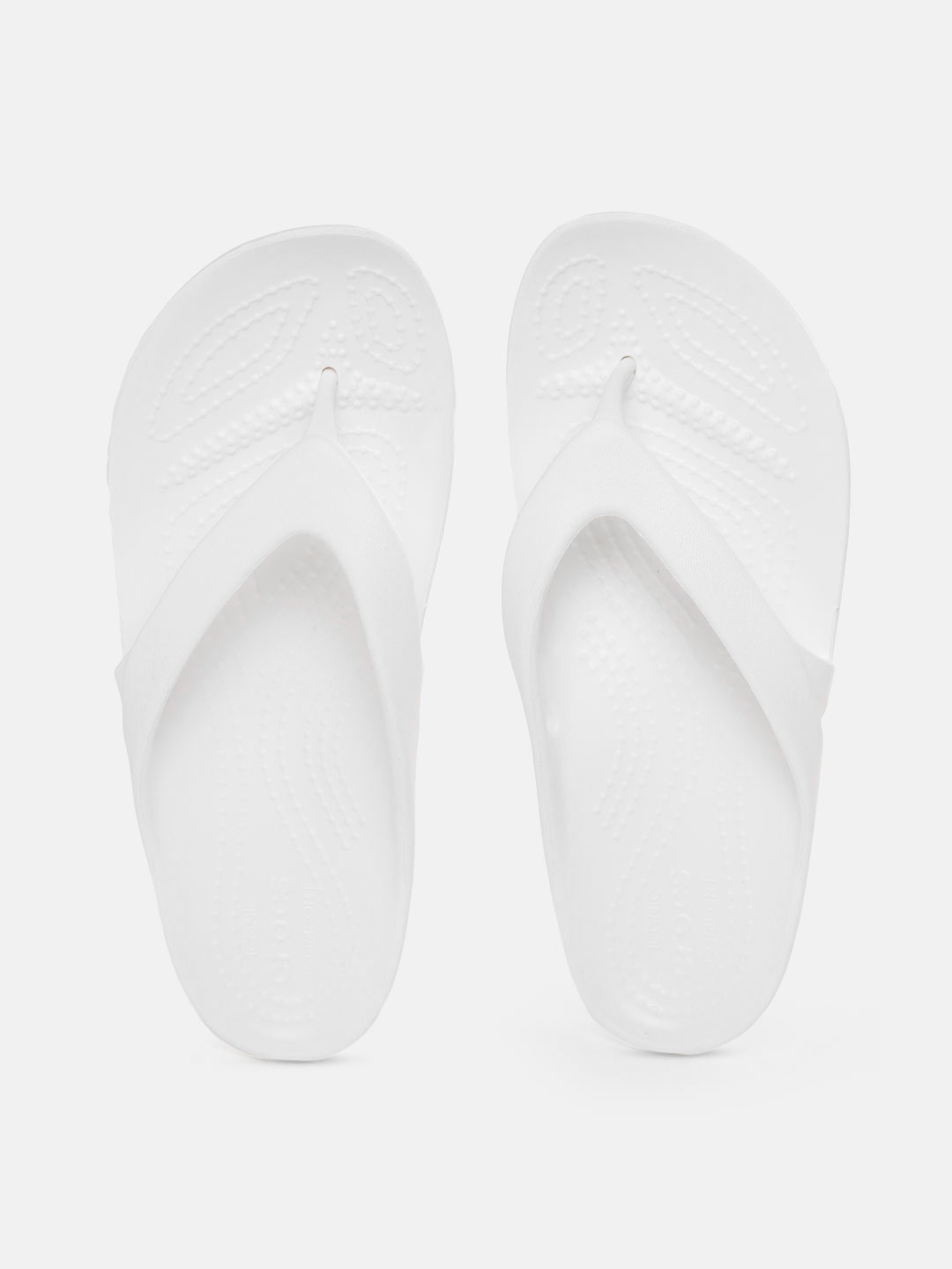 

Crocs Women White Solid Croslite Thong Flip-Flops