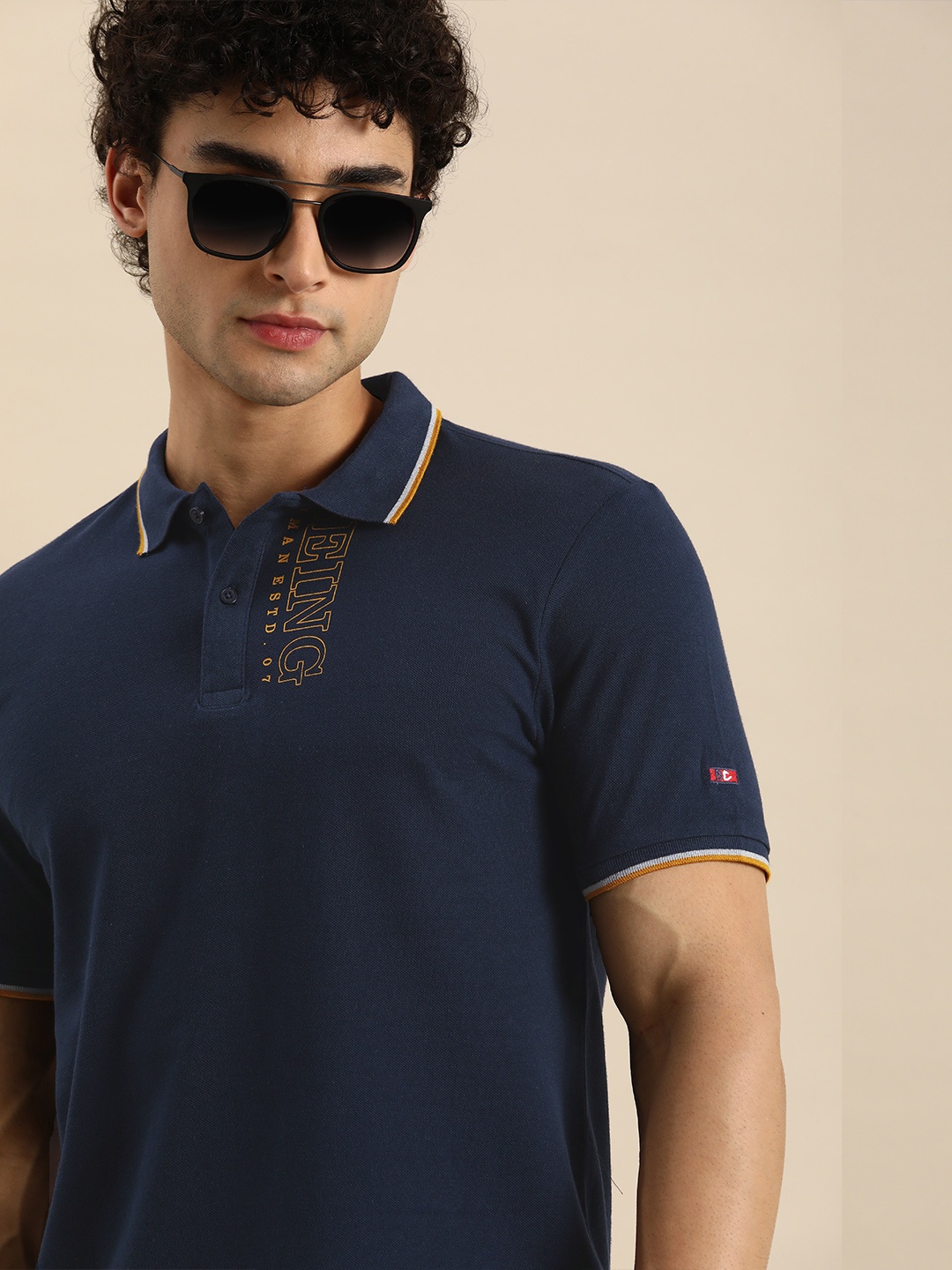 

Being Human Clothing Men Navy Blue Brand Logo Printed Polo Collar Pure Cotton T-shirt