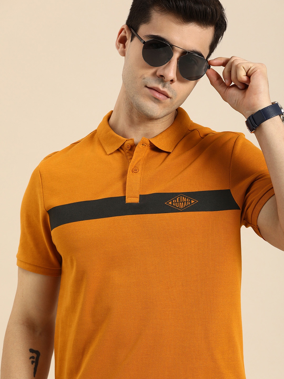

Being Human Men Brown & Black Brand Logo Striped Polo Collar Pure Cotton T-shirt