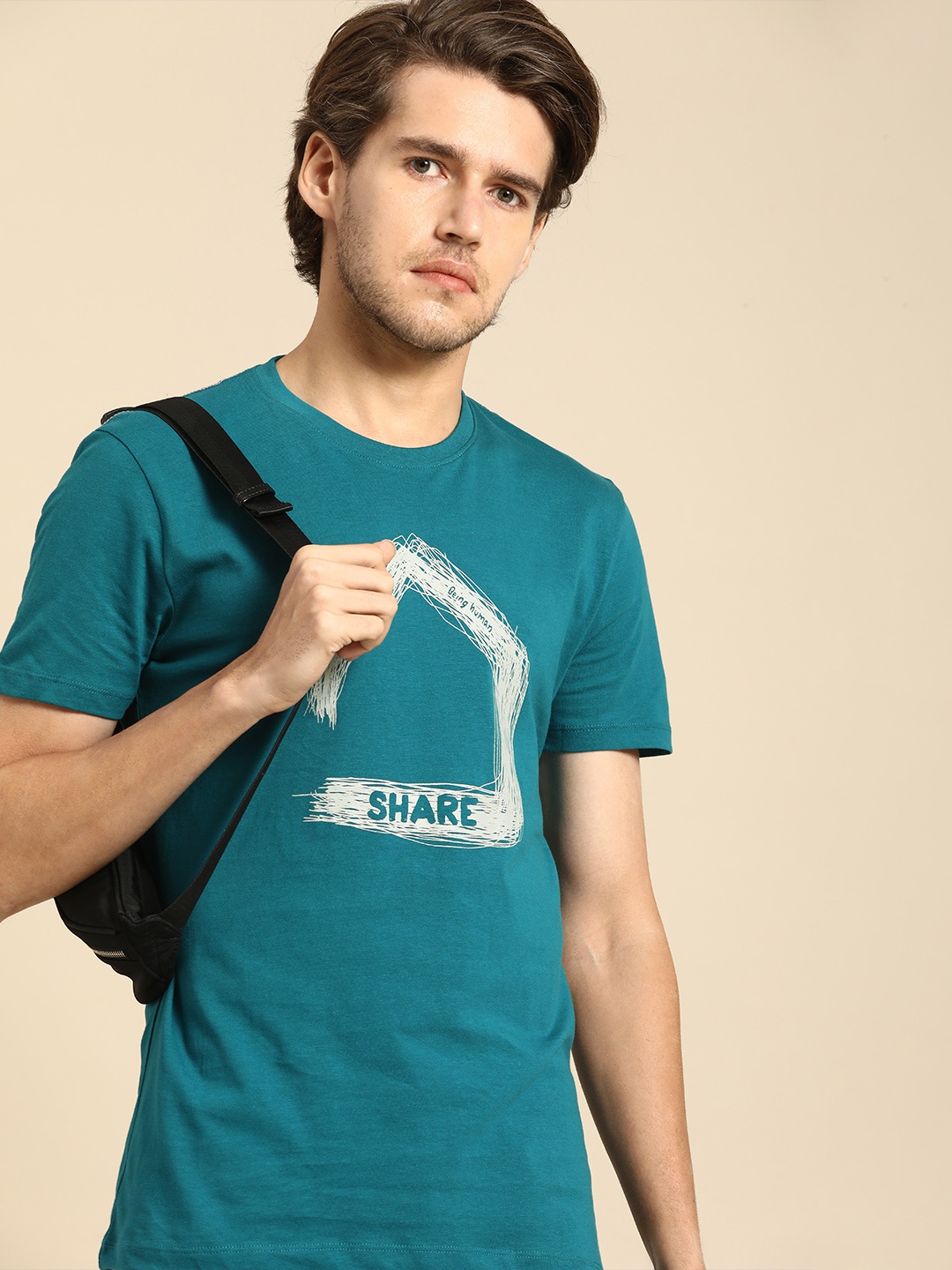 

Being Human Men Teal & Off White Printed Slim Fit Pure Cotton Casual T-shirt
