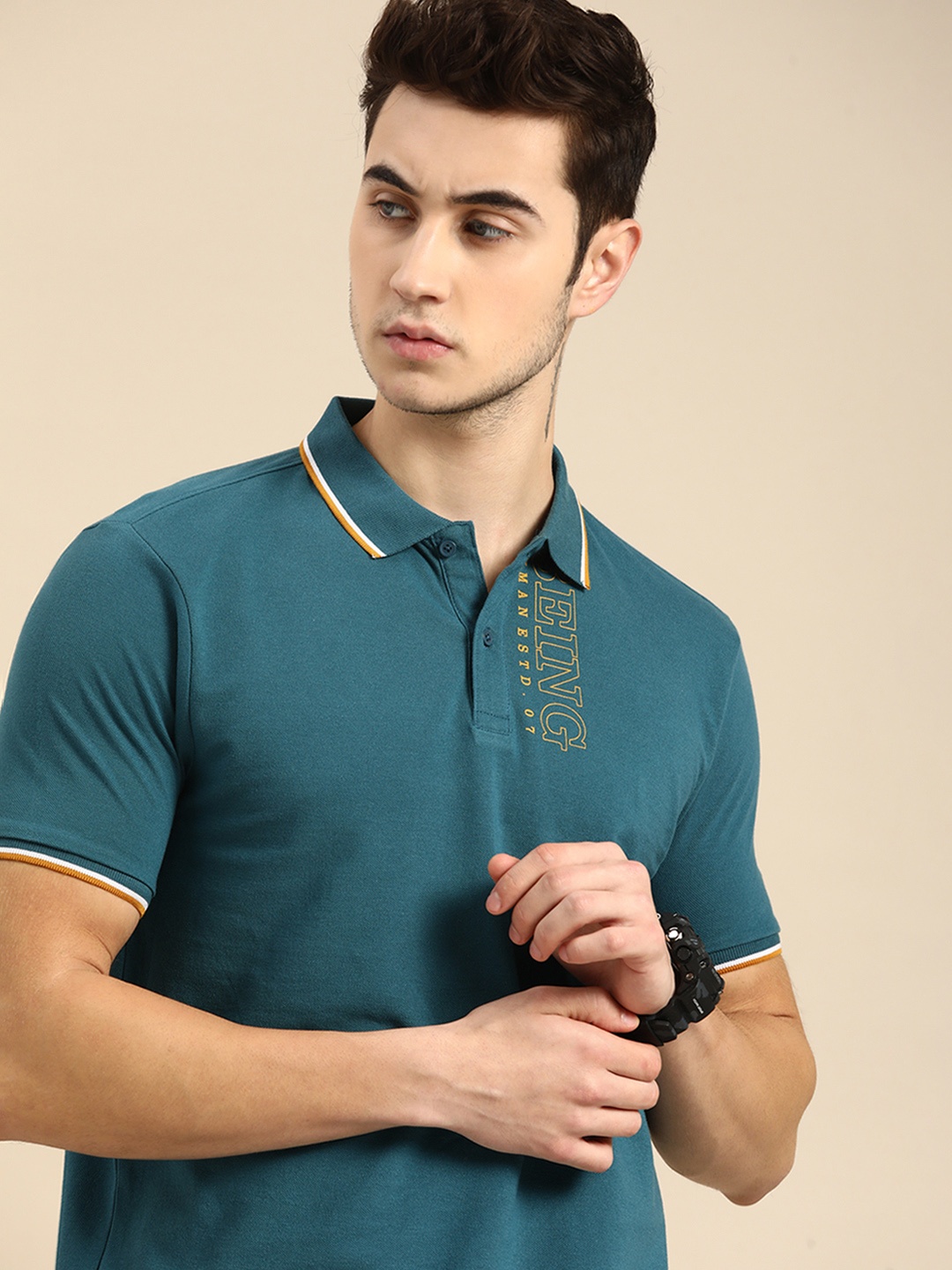 

Being Human Men Teal & Yellow Brand Logo Printed Polo Collar Pure Cotton T-shirt