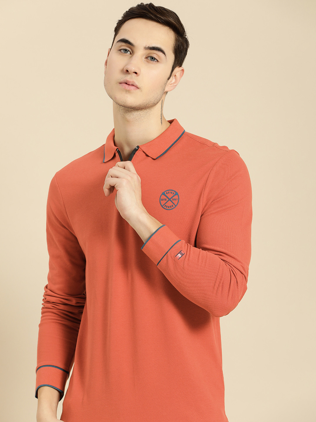 

Being Human Men Rust Orange Solid Pure Cotton Polo Collar T-shirt