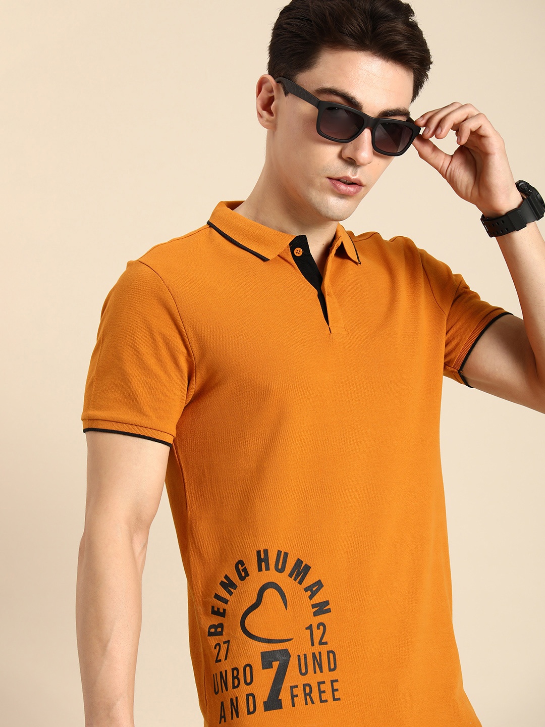

Being Human Clothing Men Pure Cotton Brand Logo Printed Polo Collar T-shirt, Mustard
