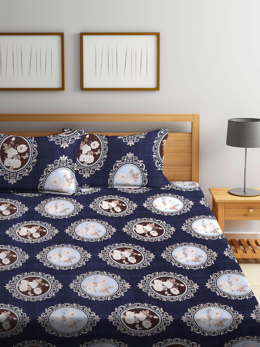 

Arrabi Blue & White Ethnic Motifs 300 TC King Bedsheet with 2 Pillow Covers