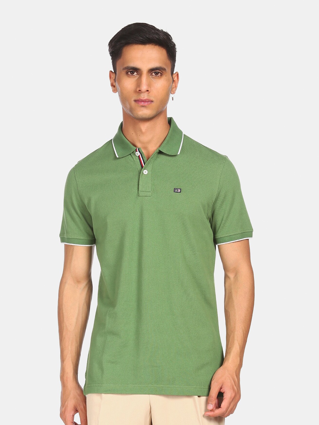 

Arrow Sport Men Green Polo Collar Pure Cotton T-shirt