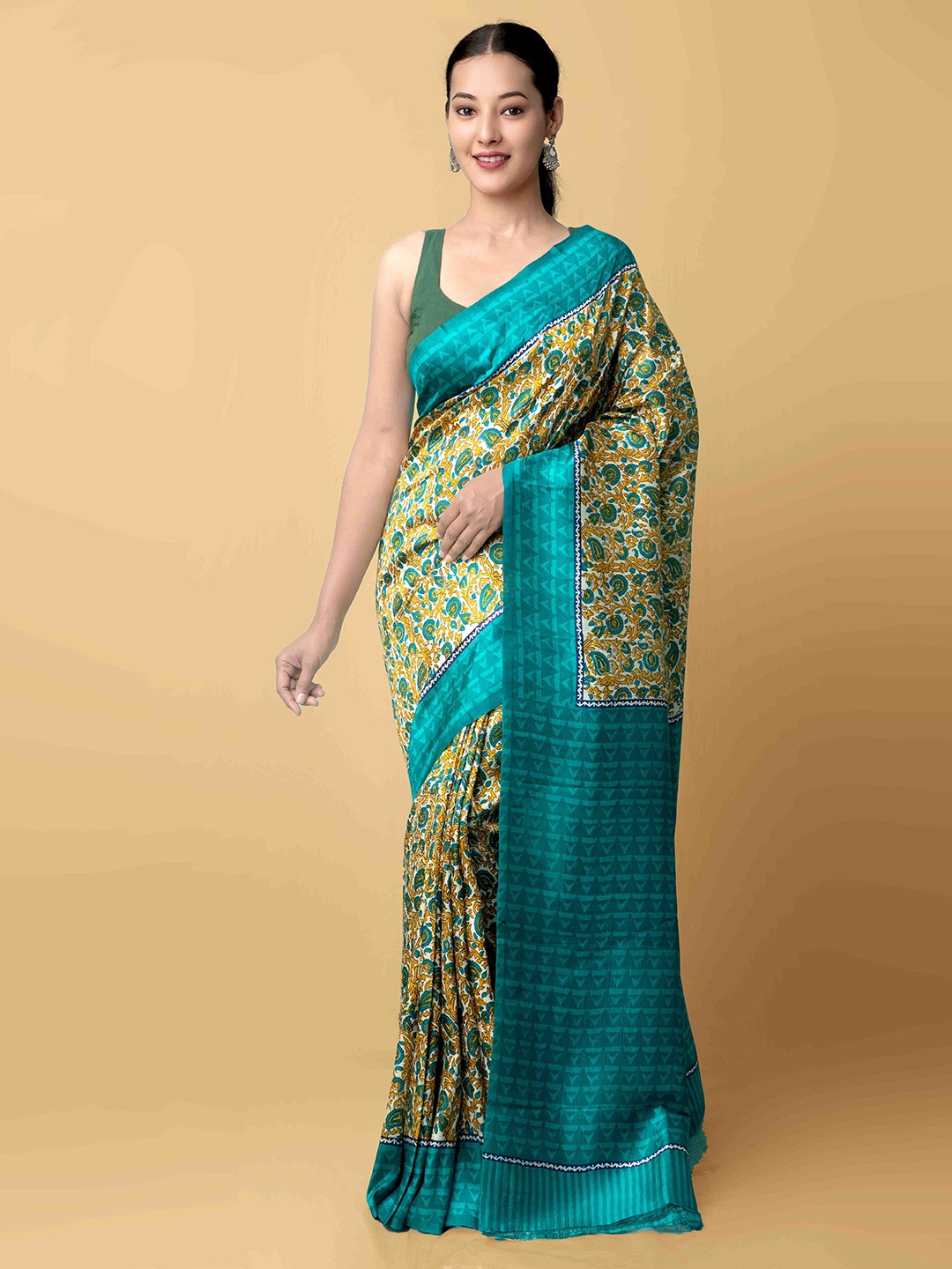 

Unnati Silks Green & Blue Ethnic Motifs Pure Silk Tussar Saree