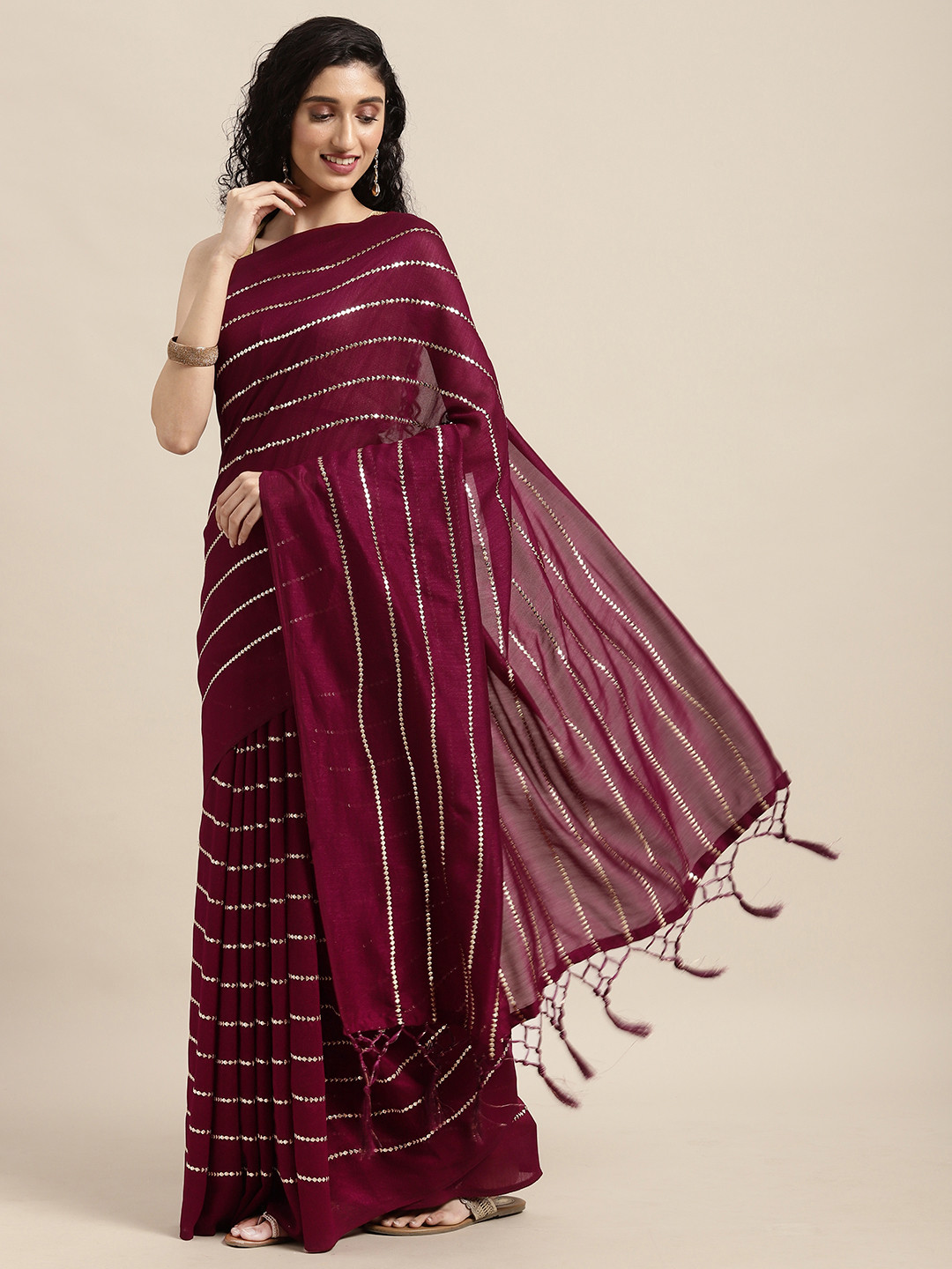 

Mitera Purple Embellished Art Silk Saree