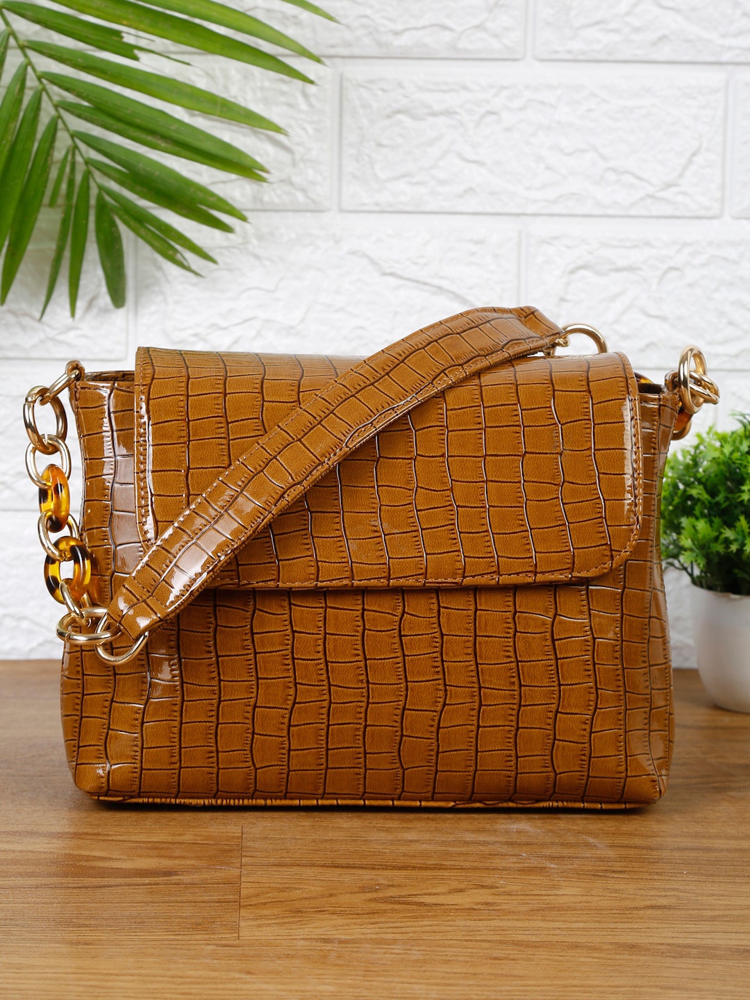 

Apsis Brown Animal Textured Structured Sling Bag