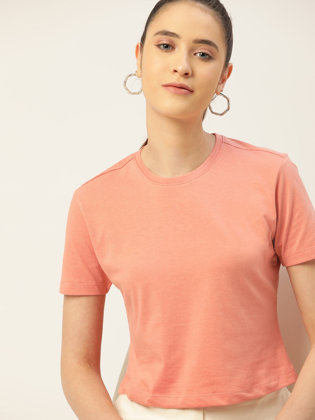 

DressBerry Women Peach Solid Sustainable T-shirt
