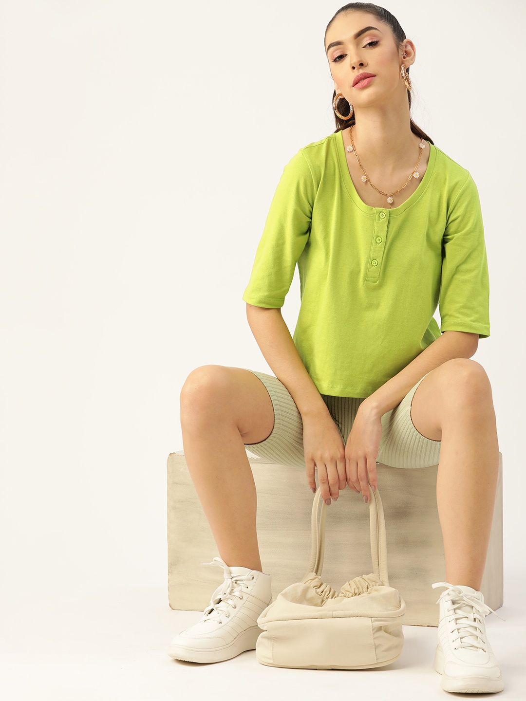 

DressBerry Women Green Solid Henley Neck Sustainable T-shirt