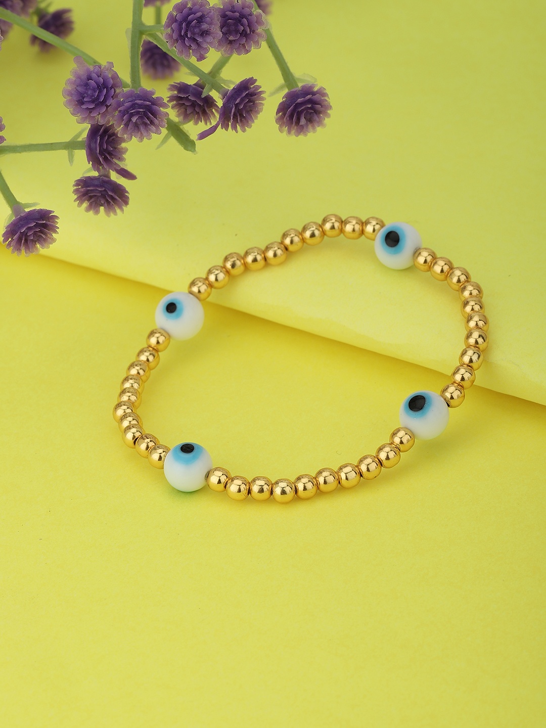 

Carlton London Women Gold-Toned & White Gold-Plated Evil Eye Beaded Elasticated Bracelet