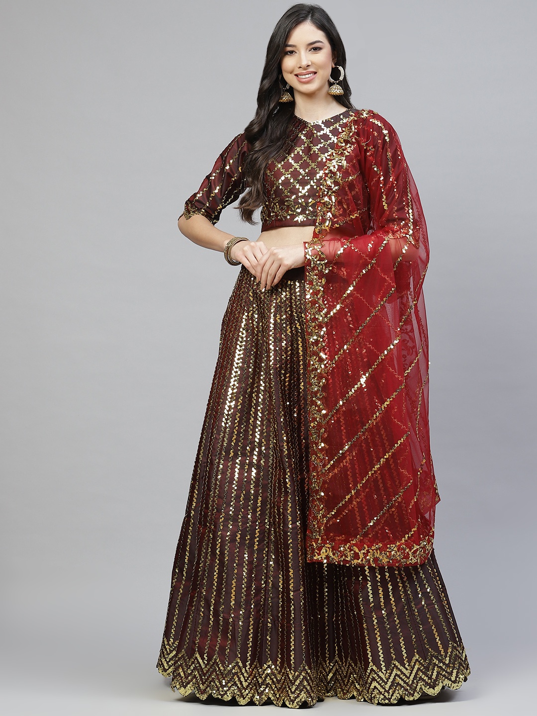 

Readiprint Fashions Maroon & Gold-Toned Embellished Sequinned Semi-Stitched Lehenga Choli