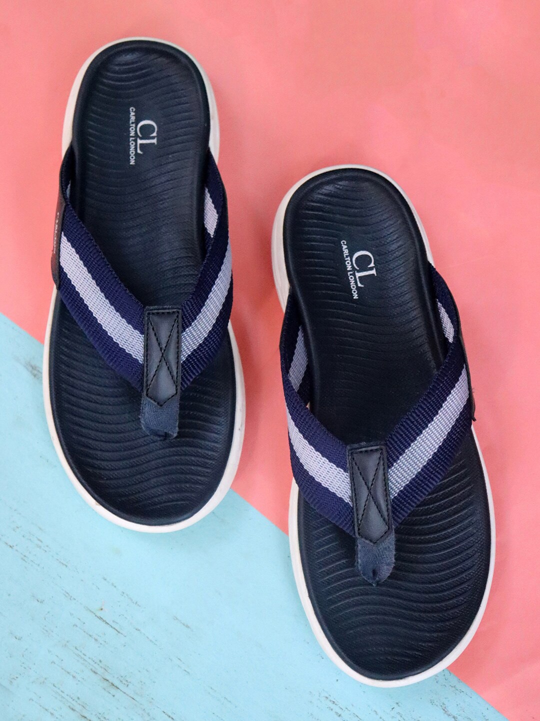 

Carlton London Men Navy Blue & White Thong Flip-Flops